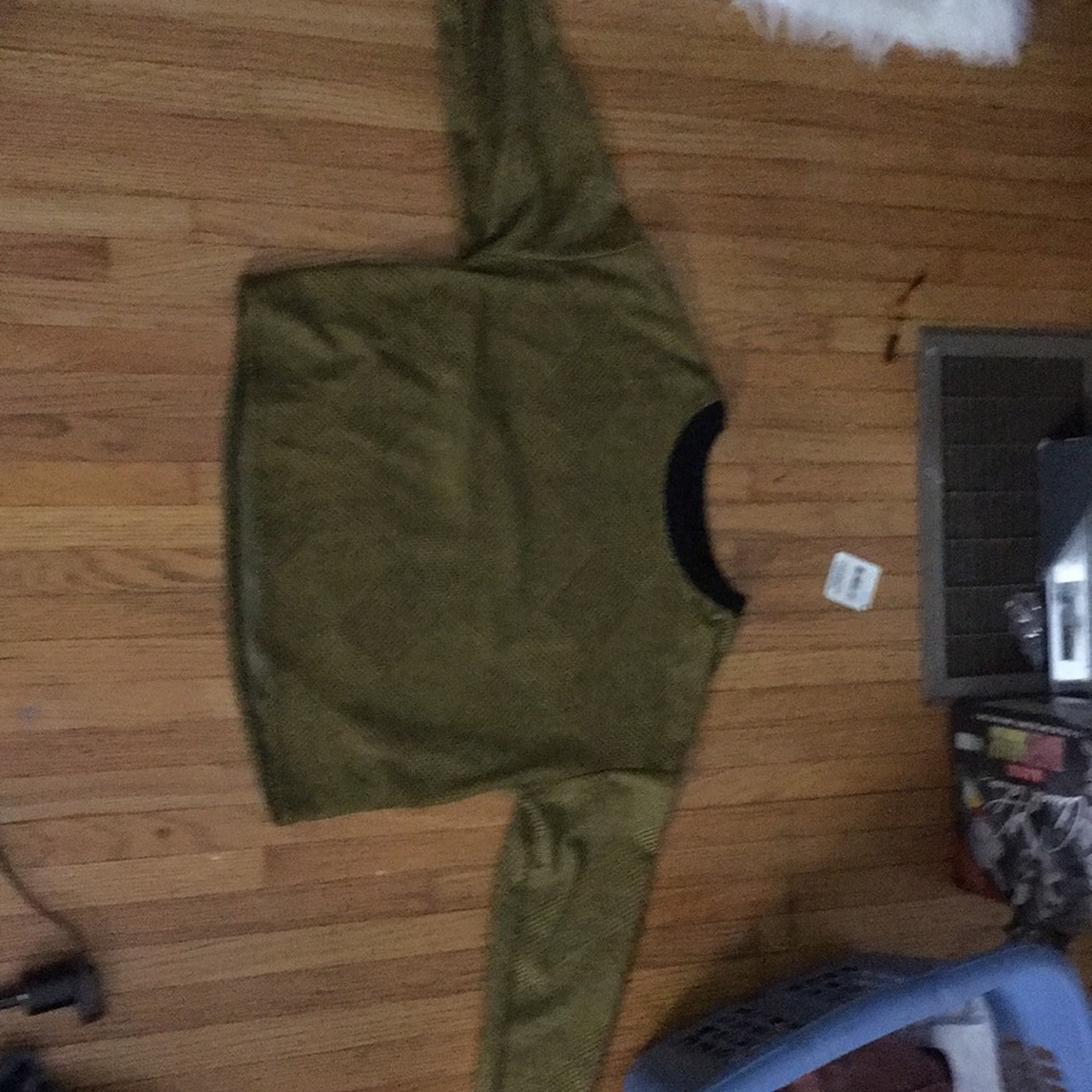 A cropped yellow long sleeve top